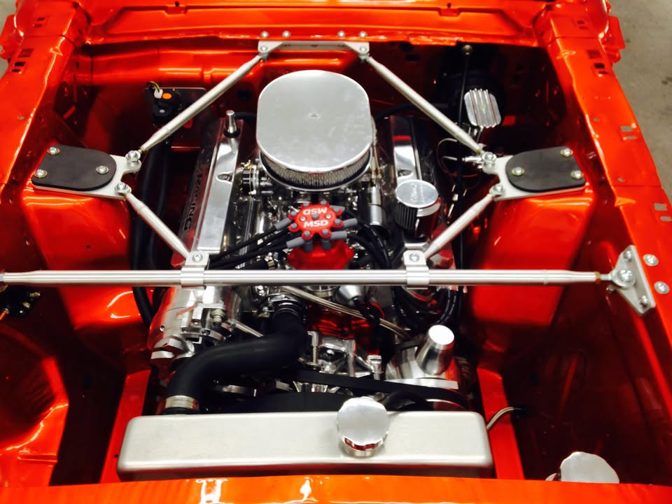 Detailed engine bay of a restored muscle car